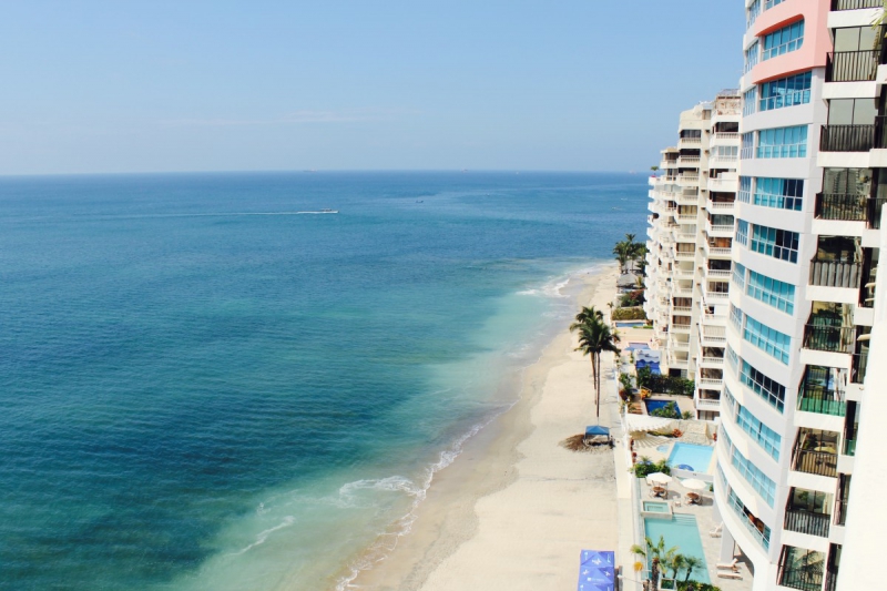 chambre-hote-CANTARON-min_beach_ocean_shore_hotel_palm_tree-33726